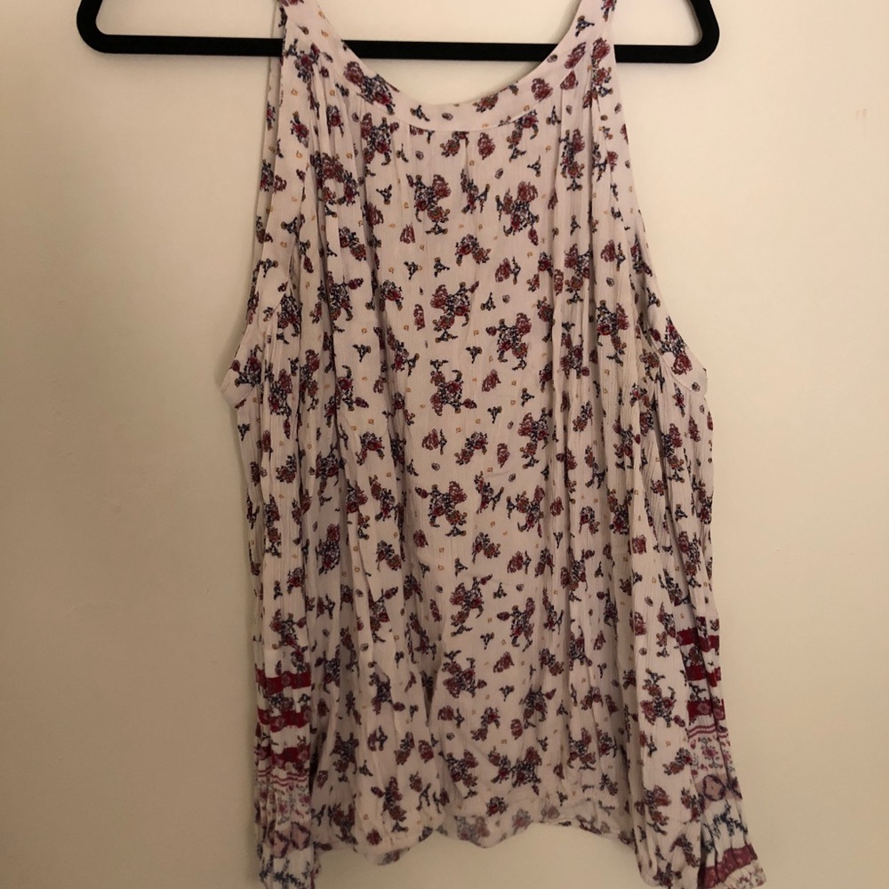 Cold shoulder floral shirt.